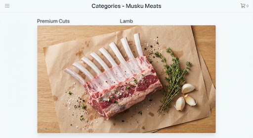 Frenched 8-rib rack of lamb with cleanly polished bones on butcher paper